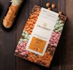 Ciocolată albă cu aromă de Portocală, dropsuri, cacao 29%, 2,5kg, Callebaut - imagine 2